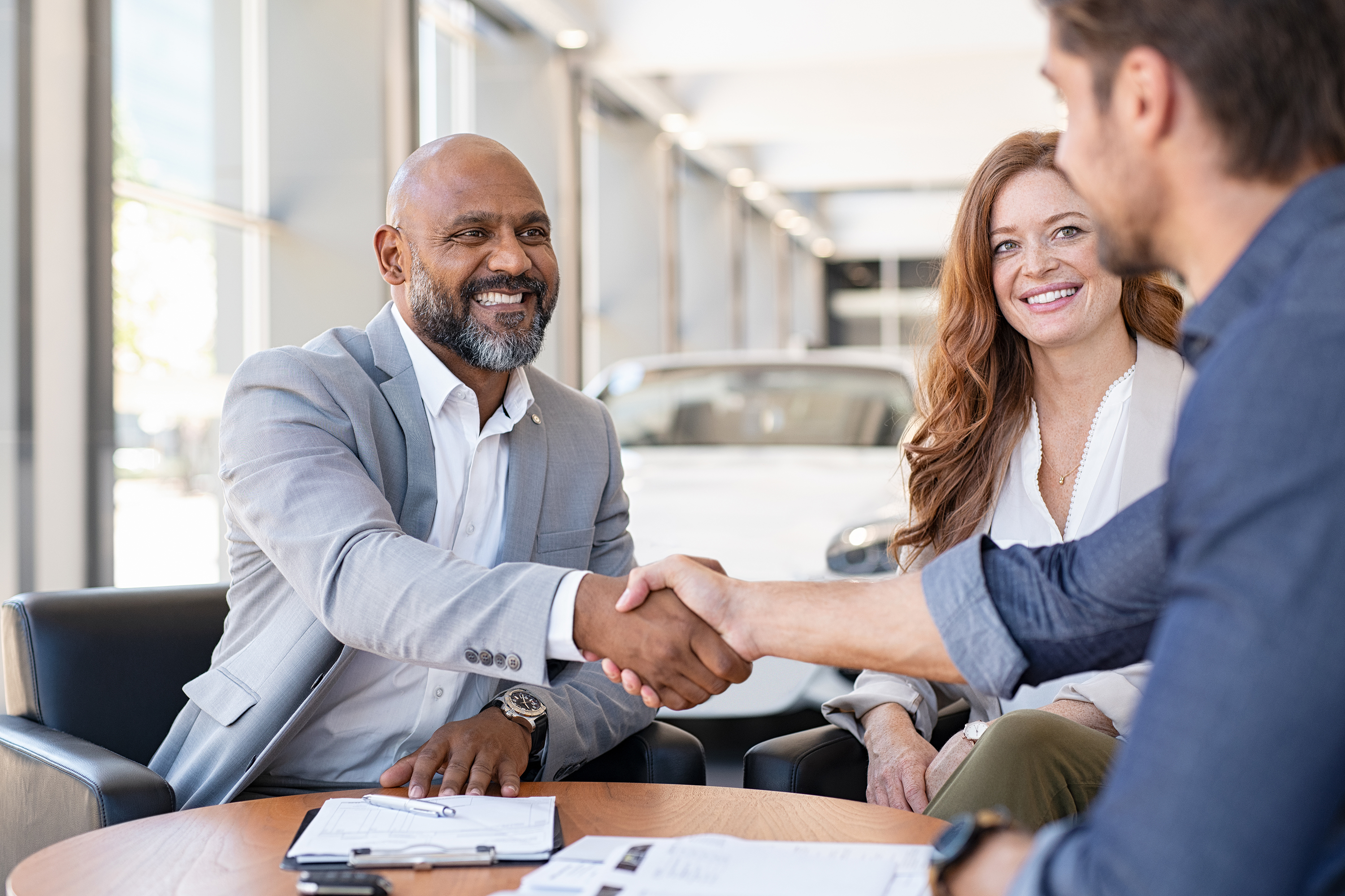 Couple at Car Dealership